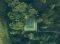 aerial photo of tennis court surrounded with trees